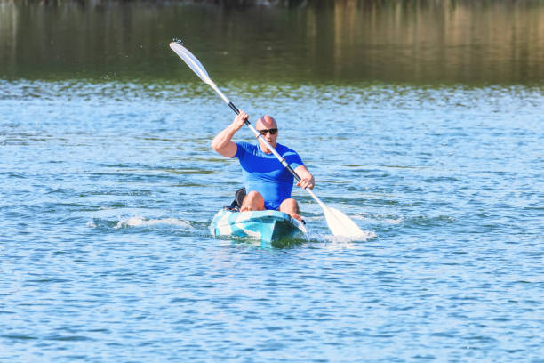 istock Young Man Kayaking on Lake. Lake Kayaking. 1145535239