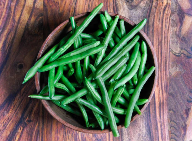 istock Green beans in a wooden bowl centered 1145537709