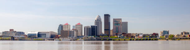 Louisvillve Cityscape The City of Louisville, in the state of Kentucky, United States of America, as seen from the Indiana river bank of the Ohio River ohio river photos stock pictures, royalty-free photos & images