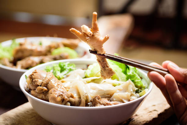 istock Rice noodles soup with stewed chicken feet 1145547880