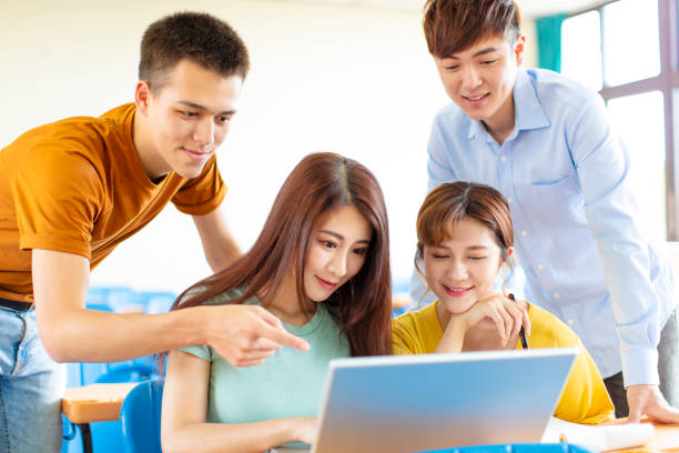 istock college students  discussing ideas in classroom 1145550702