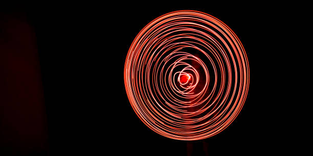 Abstract light painting - red circular lines Abstract light painting - red circular lines lightpainting stock pictures, royalty-free photos & images