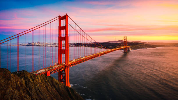 the golden gate bridge at sunset, san francisco, ca - golden gate bridge stock-fotos und bilder