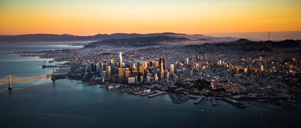 san francisco downtown skyline aerial view at sunset, california, ca - san francisco bay area stock-fotos und bilder