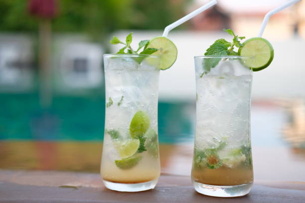 istock lime mojito cocktail and pineapple mojito cocktail 1145562058