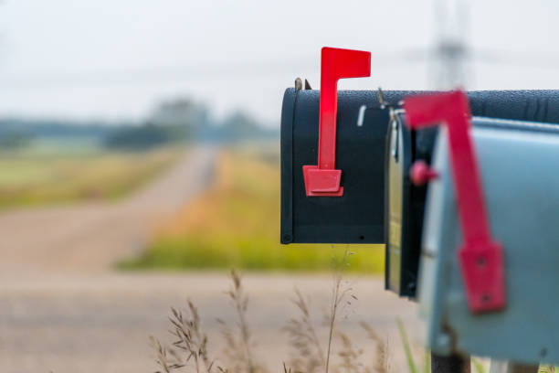 Country road and mail boxes, rural Alberta near Devon stock photo