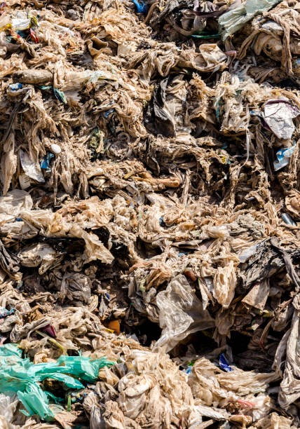istock Plastic and Other Waste in Municipal waste disposal open dump process.  Dump site at Mukdahan Province on MARCH 1 , 2016 in MUKDAHAN PROVINCE THAILAND 1145564887