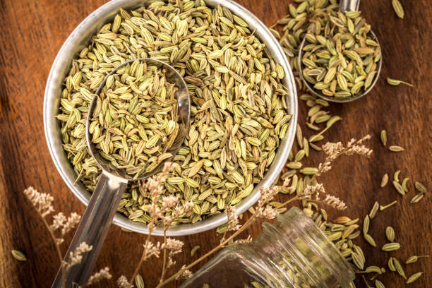 istock close up  fennel seed in  spoon on brown wooden table 1145564914