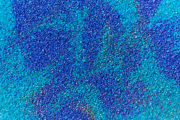 istock Layered colorful sand pattern. Marble style background. Blue and gold powder texture. 1145564994