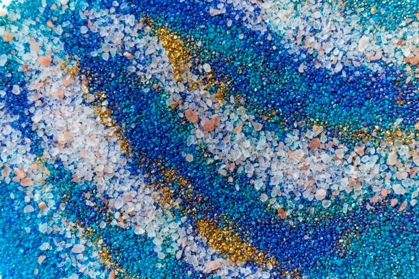 istock Layered colorful sand pattern. Marble style background. Blue and gold powder texture. 1145565115