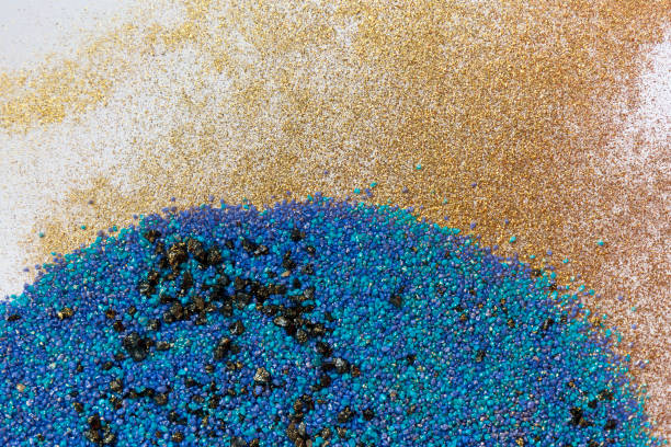 istock Colorful sand pattern. Marble style background. Blue and gold powder texture. 1145565301