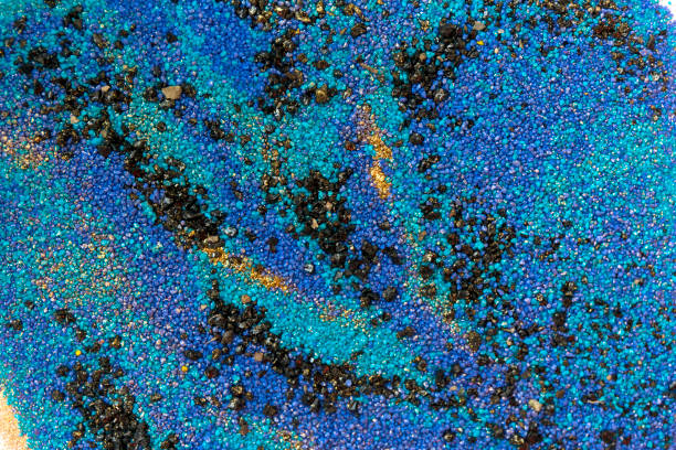 istock Layered colorful sand pattern. Marble style background. Blue and gold powder texture. 1145565316