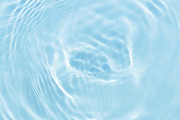 istock blue wave abstract or rippled water texture background 1145568386