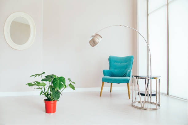 Empty waiting room in a modern hospital with green plant wall