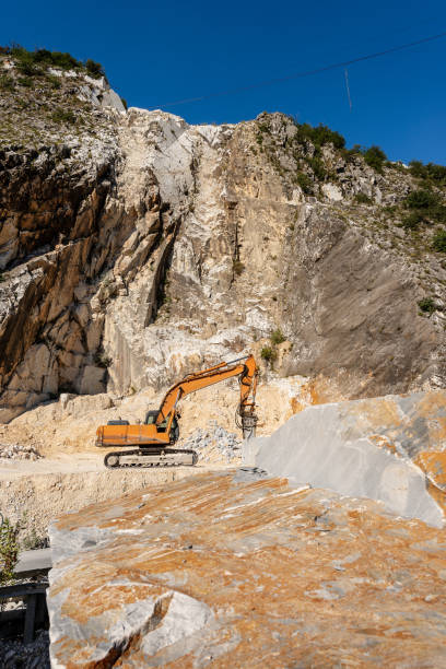 istock Italian marble quarry - Excavator with jackhammer - Apuan Alps 1145573693