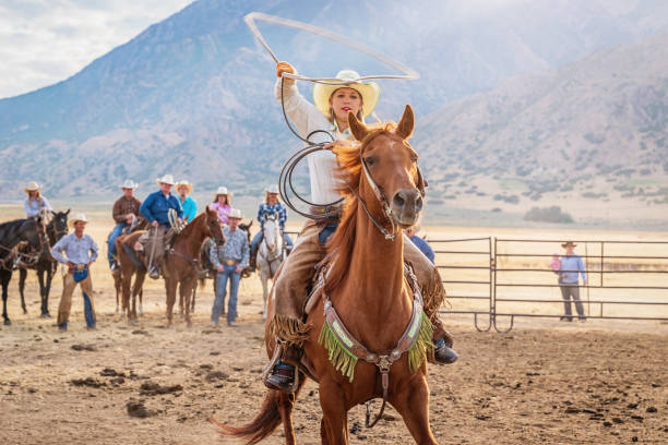 istock Rodeo Training Cowgirl throwing Lasso 1145575703