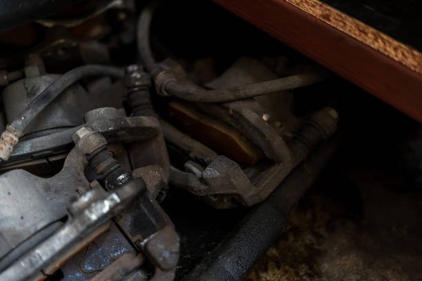 istock Disc brake and asbestos brake pads at car garage 1145582131