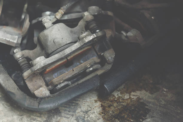 istock Disc brake and asbestos brake pads at car garage 1145582188