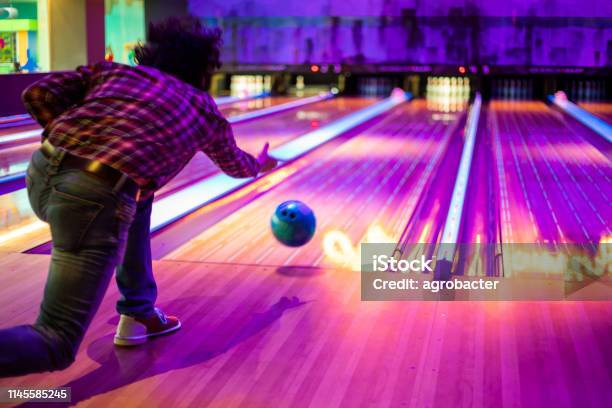 Man Playing Bowling Stock Photo - Download Image Now - Ten Pin Bowling, Bowling Alley, People