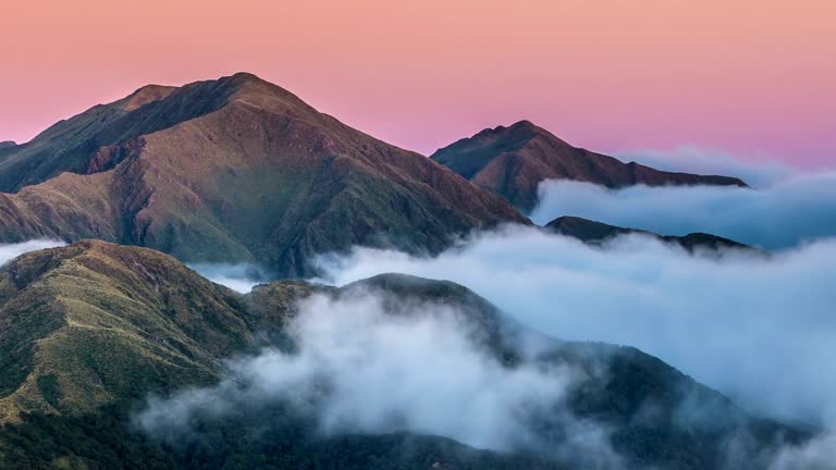 Sunrise in mountains nature above clouds in New Zealand landscape Time lapse