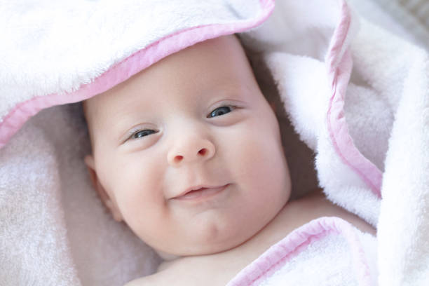 istock newborn baby smiling 1145587869