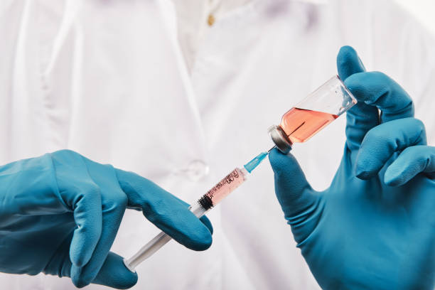 istock Filling up syringe with medicine 1145591103