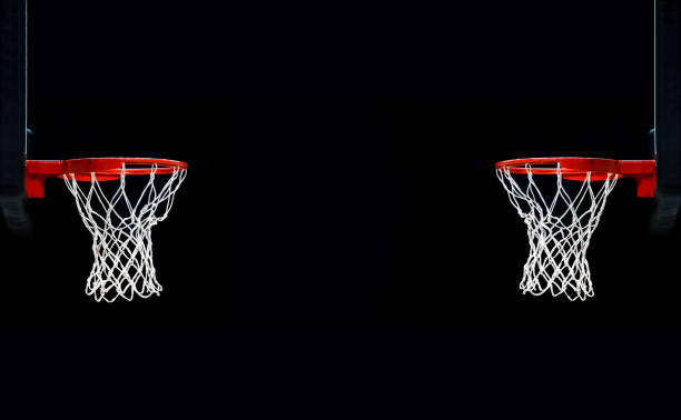 istock Basketball Hoops Against Black Background 1145599184