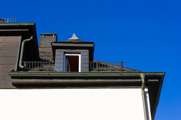 istock city house rooftops with chimney and antenna 1145599259