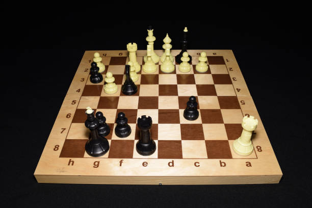 istock Chechered board with white pawns as a leisure backdrop 1145602128