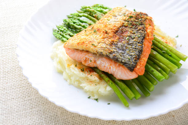 istock Grilled salmon garnished with asparagus 1145603312