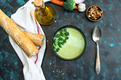 Homemade Broccoli soup with fresh baguette