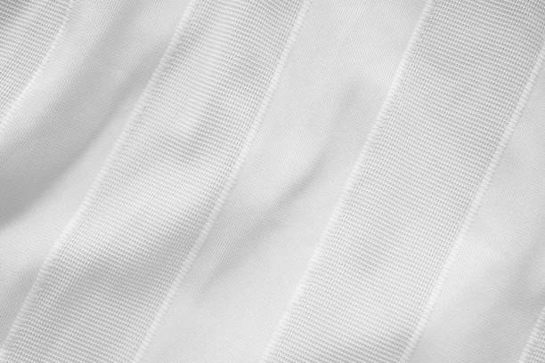 White sports wear jersey shirt clothing fabric texture White sports wear jersey shirt clothing fabric texture jersey fabric photos stock pictures, royalty-free photos & images