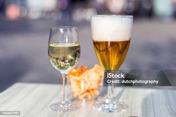 Beer And Wine On A Sunny Terrace In Ghent Belgium Stock Photo - Download Image Now - Beer - Alcohol, Wine, Ghent - Belgium