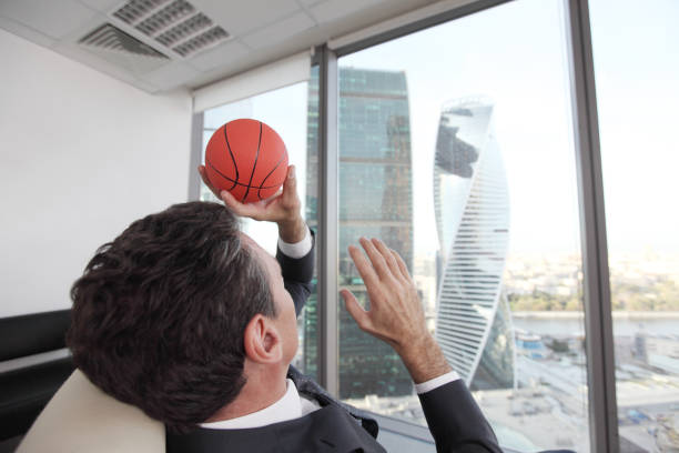 istock Businessman with basketball 1145607487