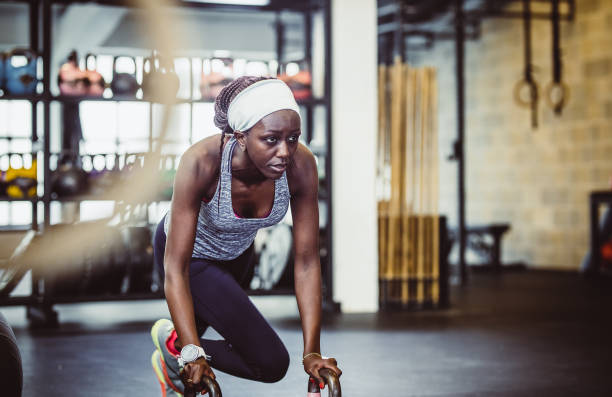 istock Woman Exercising on Medicine Ball 1145612239