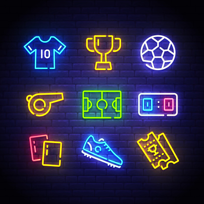 Football icons set. Soccer neon sign. Bright signboard, light banner. Neon isolated icon, emblem. Uniform, Ball, whistle, soccer ball, football field, score, shoes, ticket.