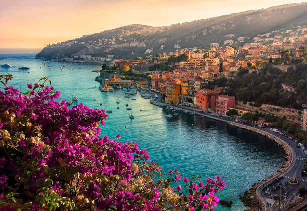 Villefranche on Sea in evening Coastline on the French Riviera with the small village : Villefranche Sur Mer french riviera photos stock pictures, royalty-free photos & images