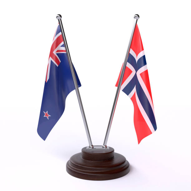 istock New Zealand and Norway, two table flags on white background 1145621310
