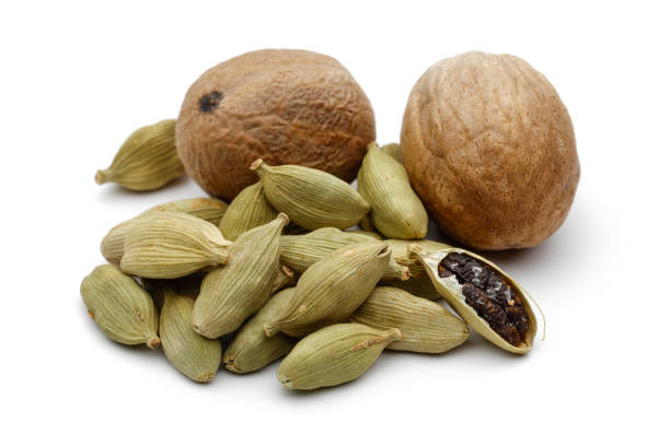 istock Nutmeg and cardamom pods isolated on white 1145622383