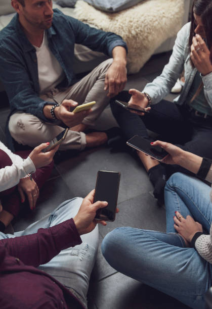 istock group of people addicted having fun together 1145623548