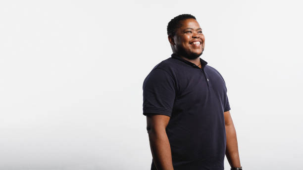 istock Portrait of cheerful african man 1145629687