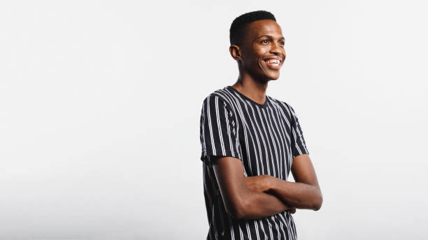 istock Smiling african man with arms crossed 1145630904