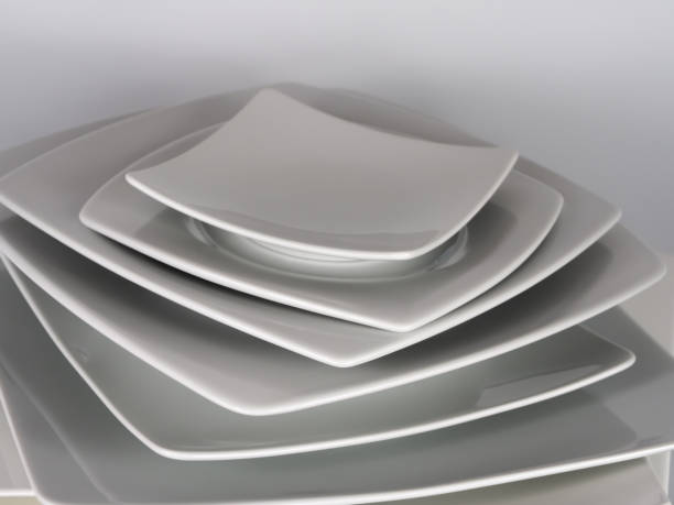 istock noble white porcelain plates 1145636328