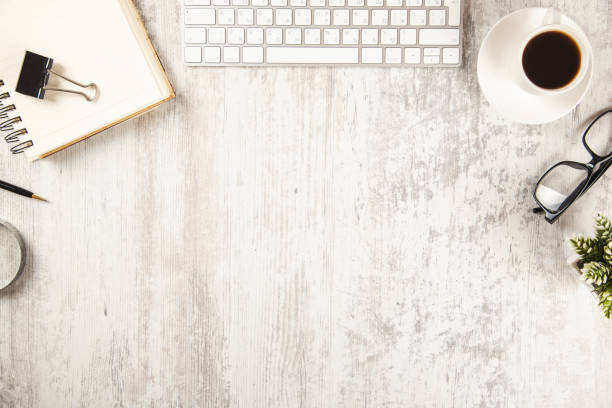 istock notepad with keyboard and stationary on desk 1145638030