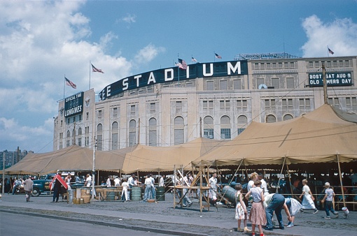 Bronx, New York City, NY, USA, 1958. In front of the old Yankee Stadium. Also: catering tents, helper, co-worker and visitors.