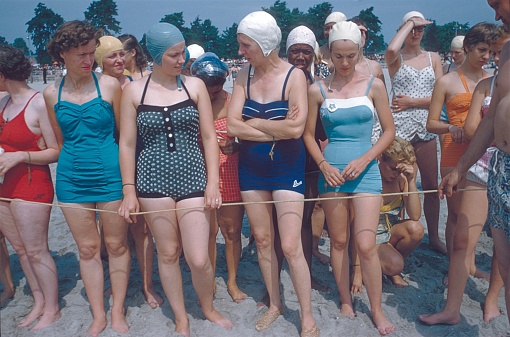 Orchard Beach, Bronx, New York City, NY, USA, 1958. New Members. Women of the Jehovah's Witness faith community are awaiting their baptism in Orchard Beach.