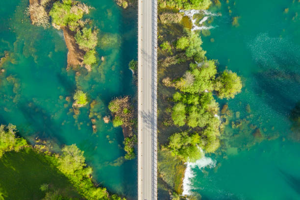 istock Road bridge over wild river Mreznica in Croatia, drone shot 1145641504