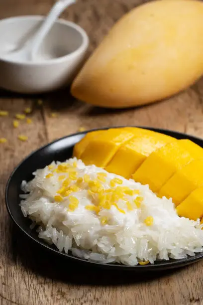 mango and sticky rice with coconut milk, traditional Thai dessert