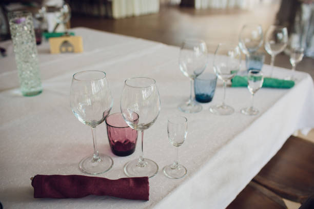 istock Empty glasses set in restaurant. Part of interior. 1145643762