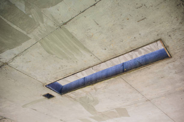 istock Cement wall with rectangle hole sewerage and electricity wiring 1145643972